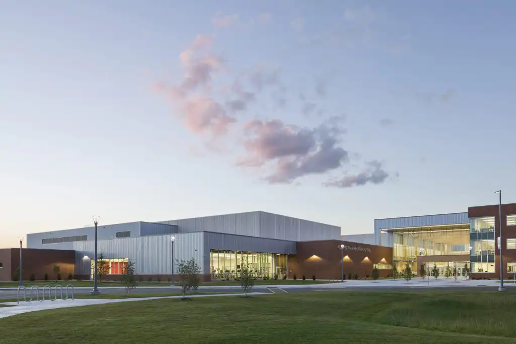Modern school building at sunset.