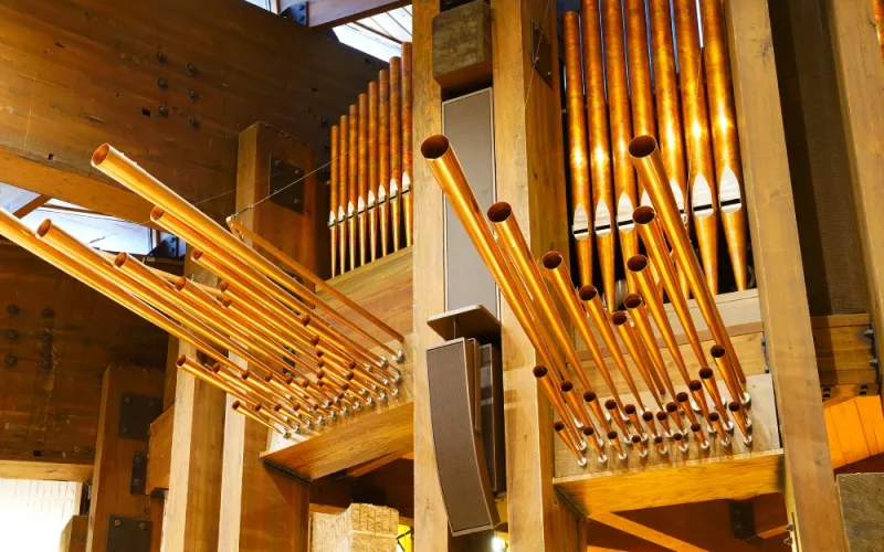 Wooden church organ pipes arrangement with Innovox loudspeakers St Therese, Deephaven MN
